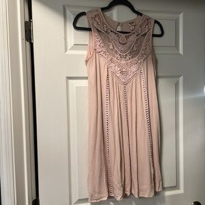 Pink short length dress.